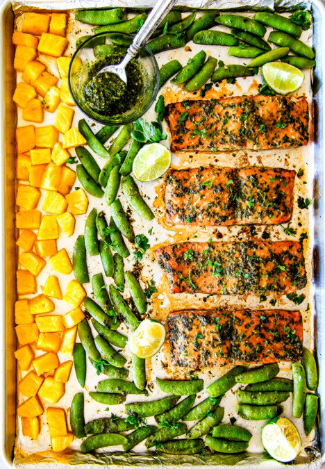 Easy SHEET PAN Asian Chimichurri Salmon is the most tender, flavorful salmon you will ever make - no joke! all cooked with pineapple and snap peas for a complete meal-in-one! An easy, satisfying dinner that tastes totally gourmet!