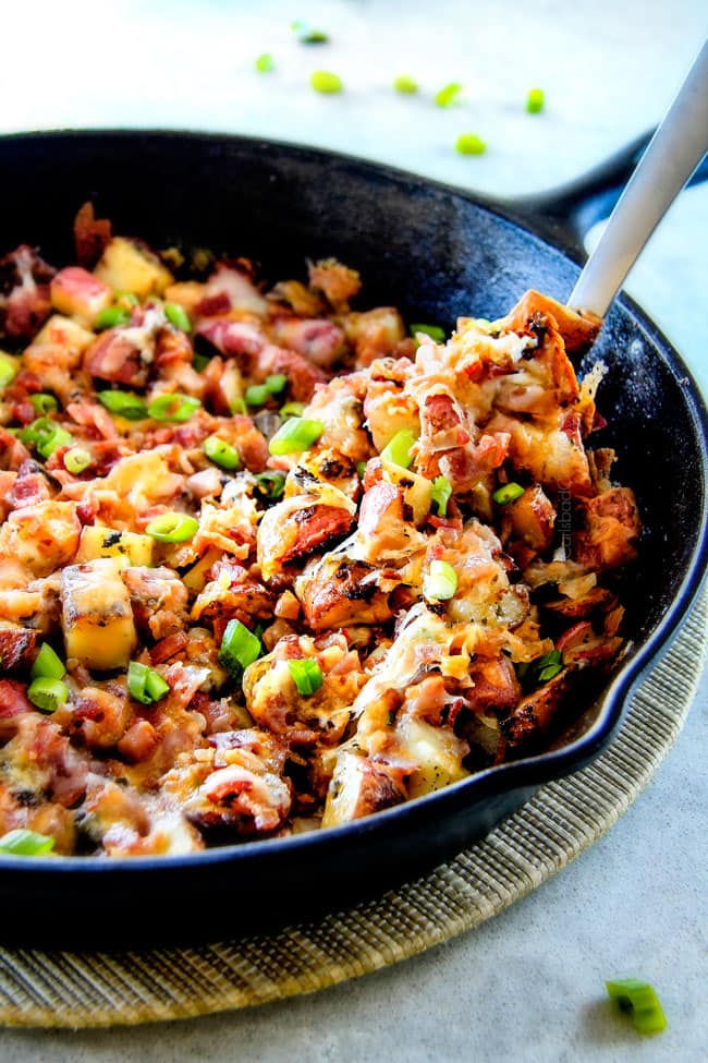 These EASY Baked or Grilled Cheesy Potatoes with Bacon are so ADDICTING! ย they are perfectly spiced, ssooooo cheesy and I love the soft centers and crispy edges! ย Tastes like potato skins but better!