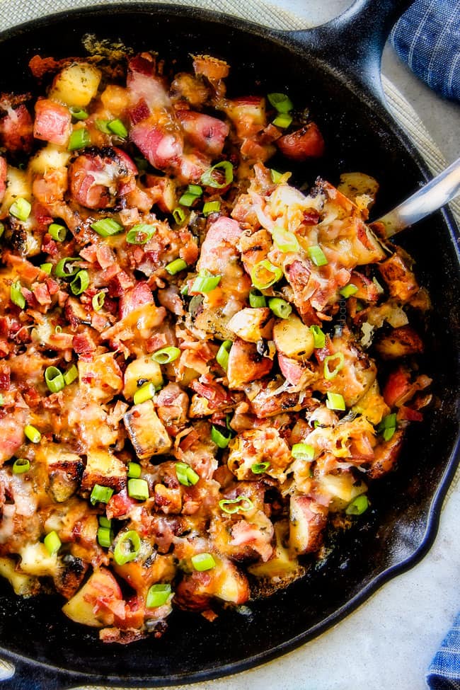 These EASY Baked or Grilled Cheesy Potatoes with Bacon are so ADDICTING! ย they are perfectly spiced, ssooooo cheesy and I love the soft centers and crispy edges! ย Tastes like potato skins but better!