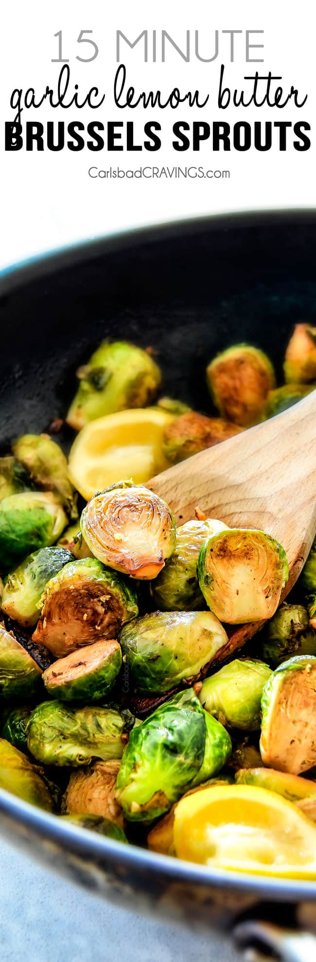 up close of Sautéed Brussels Sprouts with a wooden spoon