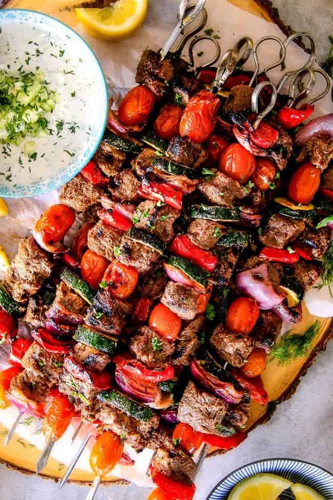 These easy Baked or Grilled Greek Beef Kabobs are so crazy juicy and exploding with flavor in every mouthwatering bite! ย And the creamy, refreshing Whipped Fetaย Whipped Feta Tzatziki Dip is out of this world! ย