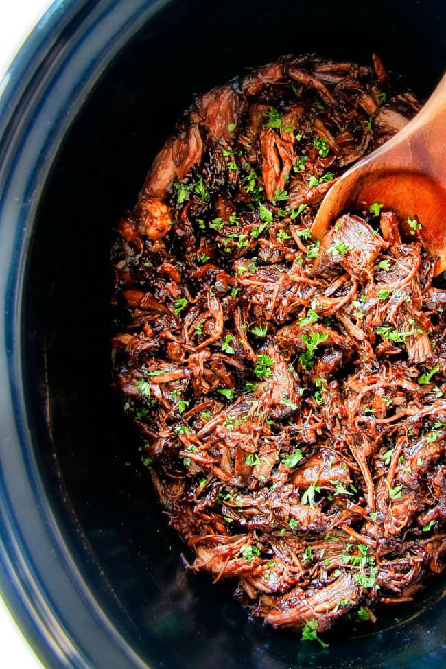 I am obsessed with this sweet and tangy, savory Slow Cooker Honey Balsamic Beef!!! ย It's fall apart tender, crazy juicy, packed with flavor and smothered in the most AMAZING honey balsamic sauce! ย perfect for sandwiches or stand alone delicious with rice and potatoes! moist slow cooker roast beef without vegetables in a crockpot