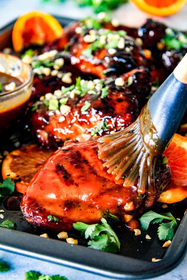 this Thai Orange Peanut Chicken (Grilled or Baked) is phenomenal! ย Its one of my favorite sweet, tangy savory chicken recipes ever! ย the chicken is soooooo juicy and the sauce is out of this world!ย