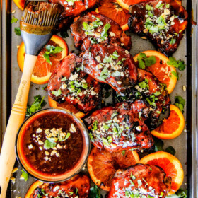 this Thai Orange Peanut Chicken (Grilled or Baked) is phenomenal! ย Its one of my favorite sweet, tangy savory chicken recipes ever! ย the chicken is soooooo juicy and the sauce is out of this world!ย