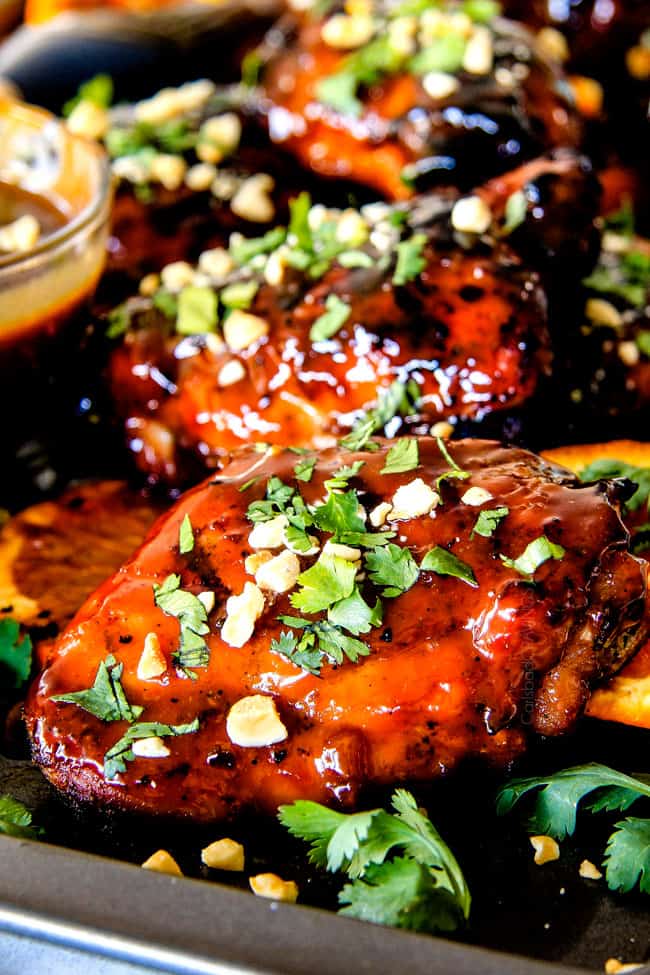 this Thai Orange Peanut Chicken (Grilled or Baked) is phenomenal! ย Its one of my favorite sweet, tangy savory chicken recipes ever! ย the chicken is soooooo juicy and the sauce is out of this world!ย