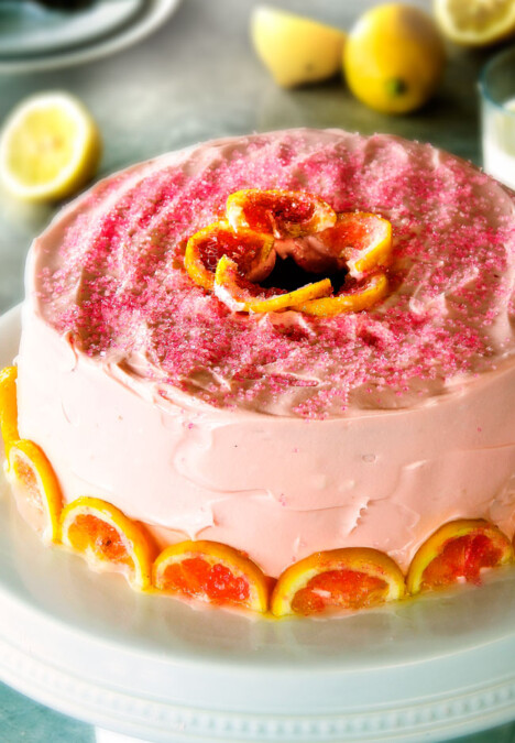 Moist, rich Pink Lemonade Cake smothered with tangy Lemon Buttercream frosting is wonderfully delicious and perfect for birthday parties or baby showers!