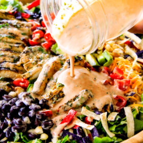 I couldn't stop eating this Cilantro Lime Chicken Taco Salad! ย Its bursting with tender, juicy chicken and the sweet & tangy Creamy Baja Catalina Dressing is out of this world delicious! ย This combo is pure heaven!