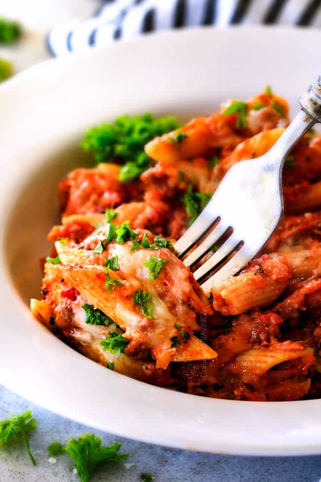 This Million Dollar Baked Penne has been a family favorite for decades!ย We serve it at all our family gatherings because its SO good, so easy!ย The homemade sauce is incredible and the hidden layer of creamy/cheesiness is to live for!ย