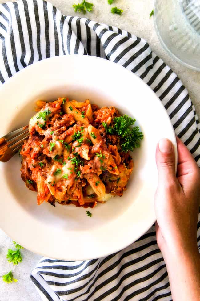 This Million Dollar Baked Penne has been a family favorite for decades!ย We serve it at all our family gatherings because its SO good, so easy!ย The homemade sauce is incredible and the hidden layer of creamy/cheesiness is to live for!ย