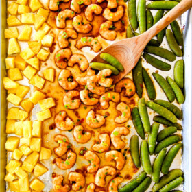 I am in love with this Sheet Pan Teriyaki Shrimp, Pineapple and Snap Peas! ย Its SO easy, healthy, a meal-in-one and the homemade Teriyaki sauce is the best I've ever had (DON'T be tempted to use store bought!)! ย I'm always keeping frozen shrimp on hand so I can make this any time!ย