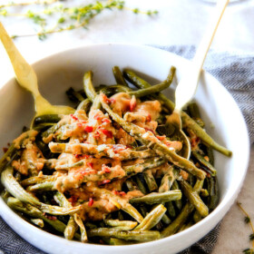 Forget green bean casserole, these wonderfully flavorful, crisp tender Roasted Green Beans with Creamy Gruyere Sauce are AMAZING!!!ย They the best green beans you will ever eat!ย ย They are easy enough for every day but delicious enough for special occasions (like Thanksgiving, Christmas!)!ย