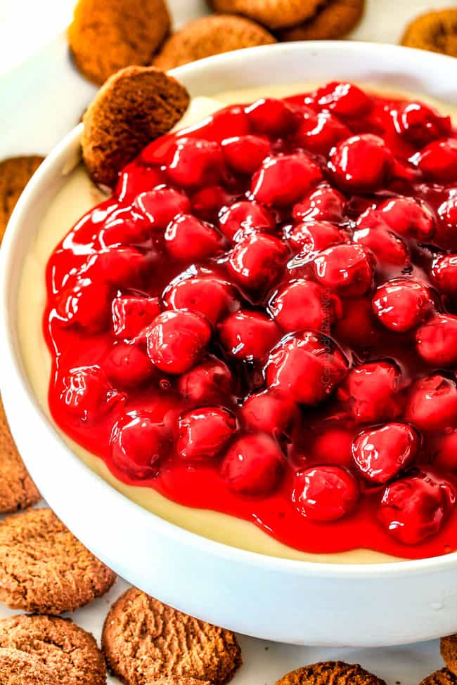 Close up of Cherry Cheesecake Dip with gingersnap cookies.