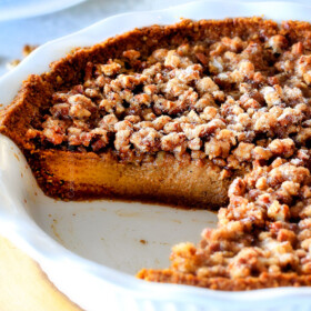 I will never go back to just Pumpkin Pie again!ย This Pumpkin PRALINE Pie is a Thanksgiving and Christmas must!ย Creamy pumpkin pie topped with crunchy, chewy brown sugar pecans for the perfect flavor and texture combination in every bite!ย ย