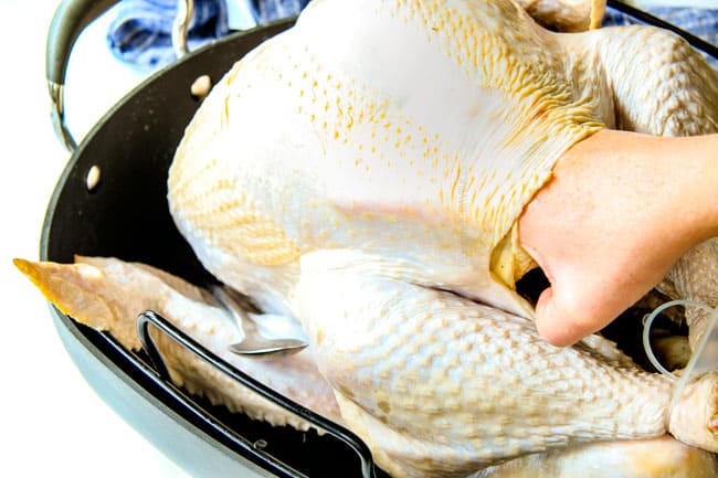 Preparing Roast Turkey with Herb Butter.