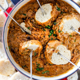 ย This French Onion Cheese Fondue with rich, deeply caramelized onions and bubbling Gruyere and Smoked Gouda is a party MUST!ย Its easy to prepare, crazy delicious and the hit of every party!ย