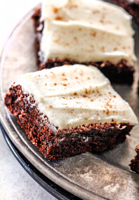 Soft and chewy Gingerbread Brownies are your favorite holiday cookie in rich chocolate brownie form all smothered in luscious Eggnog Cream Cheese Frosting!  These are destined to become a must make holiday favorite and so much easier than rolling/baking individual cookies! 