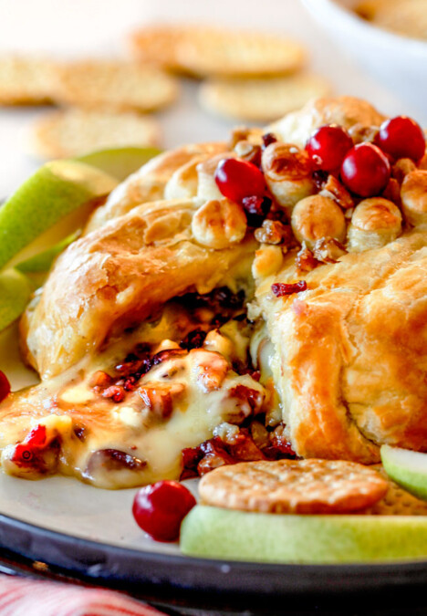 Rich and creamy Baked Brie in Puff Pastry is always a total luxuriously tasting crowd pleaser with minimal effort!ย (step by step pictures included)ย It can be prepped in advance then baked when you're ready for company!ย