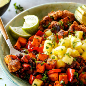 30 Minute Cajun Chicken Bowls bursting with avocados, black beans, sweet potatoes and pineapple!ย These are spicy, fresh, healthy and ADDICTING!ย ย