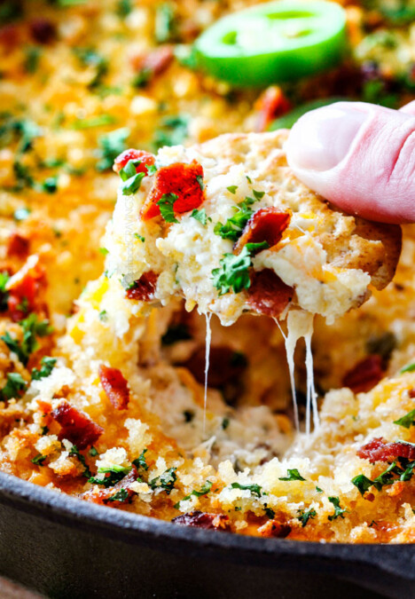 This quick and easy Jalapeno Popper Dip recipe tastes like your favorite appetizer in EASY, warm, creamy, cheesy addicting dip form!ย It is my go-to party appetizer that everyone LOVES!!!ย