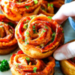 These Pizza Pinwheels are super easy to make, customizable, freeze beautifully, and absolutely irresistible for snacks, appetizers or fun meals! You friends and family will beg you to make these!
