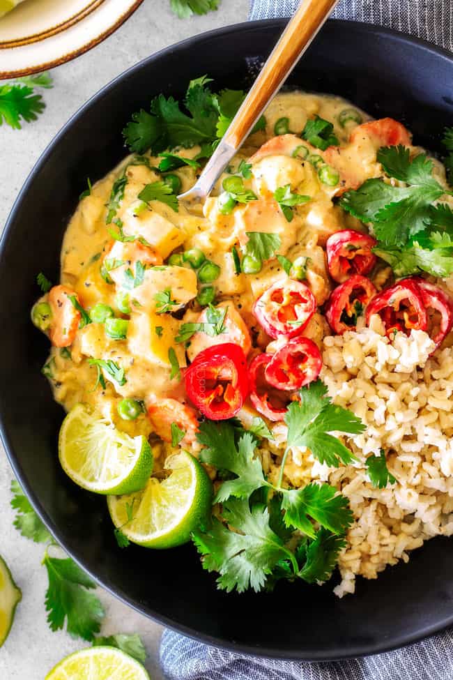 This EASY Thai Yellow Curry with Chicken tastes straight out of a restaurant!ย Its wonderfully thick and creamy, bursting with flavor and veggies (I highly recommend the listed potatoes, cauliflower and peas) and all made in one pot! Definitely a hit at our house!