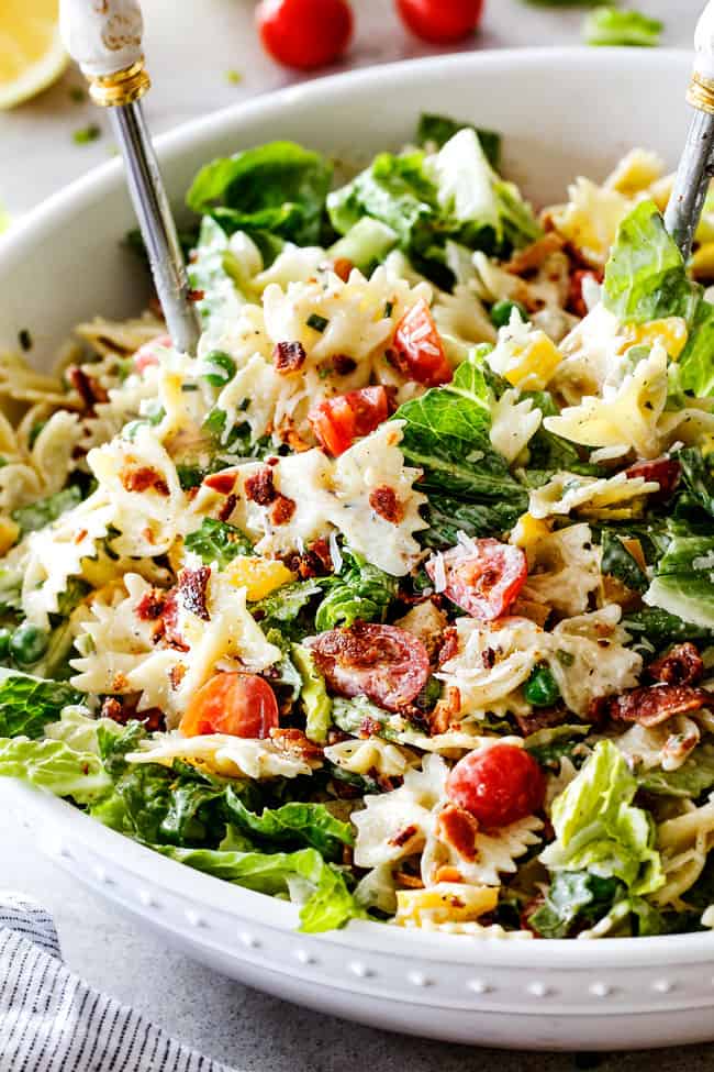 Up close side shot of easy BLT Pasta Salad recipe in a white bowl