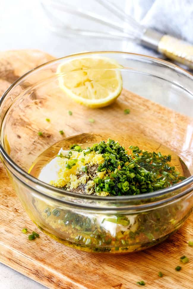 Showing how to make Lemon Chive Dressing for easy BLT Pasta Salad Recipe by putting olive oil, mayonnaise, lemon juice, lemon zest in a glass bowl