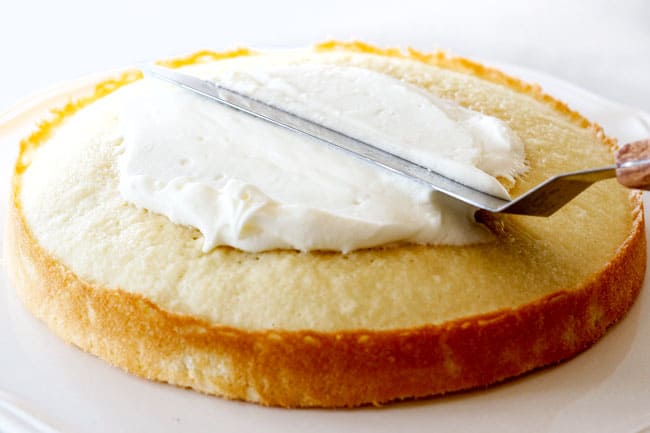 How to make best Coconut Cake by frosting the top of the cake with Coconut Frosting