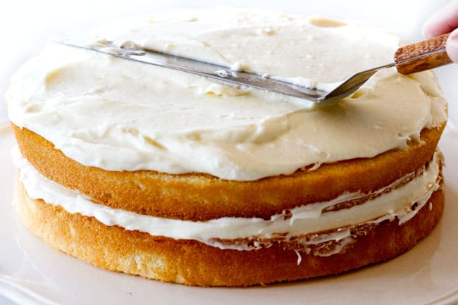 How to make simple Coconut Cake by frosting the top of the Cake with Coconut FRosting