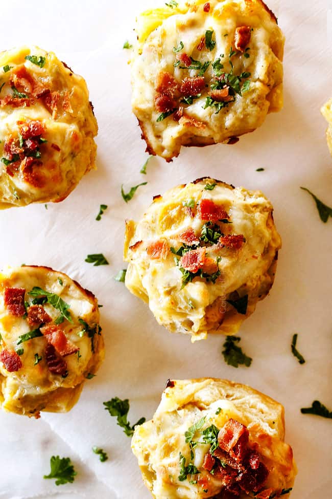 top view of Artichoke Dip Bites on a white marble pedestal