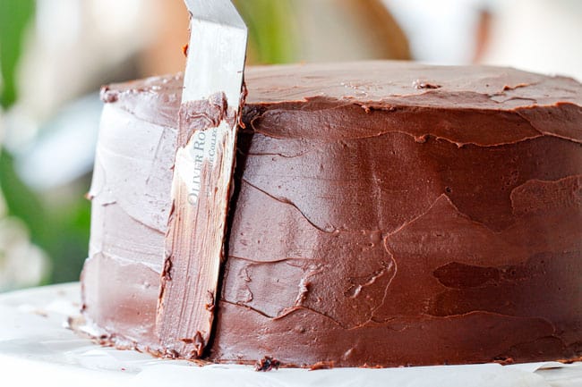 frosting moist Chocolate Raspberry Cake with ganache