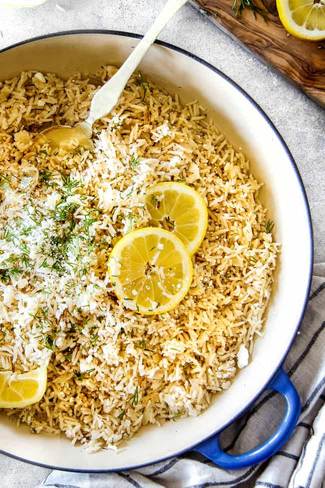 Showing how to make Lemon Rice in rice cooker by adding all ingredients to rice cooker