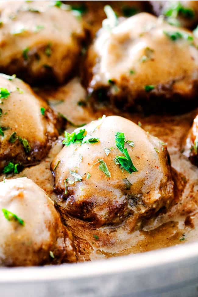 up close of Swedish Meatballs with sour cream in Swedish Meatball Sauce