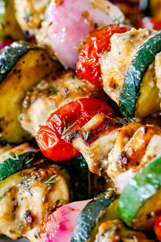 Chicken Souvlaki with tomatoes, chicken and zucchini on wooden skewers