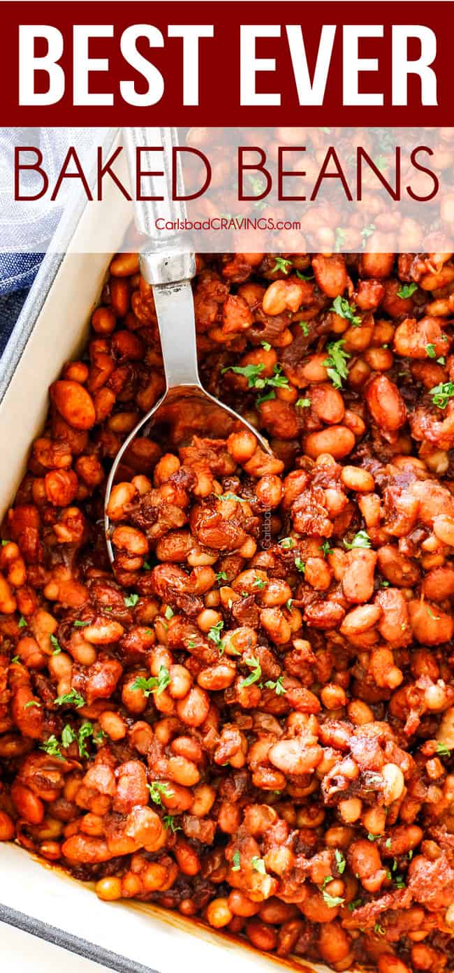 top view of homemade Baked Beans in a blue 9x13 baking dish with green parsley