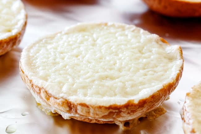 Toasting cheese on a bun for easy Brisket Sandwiches