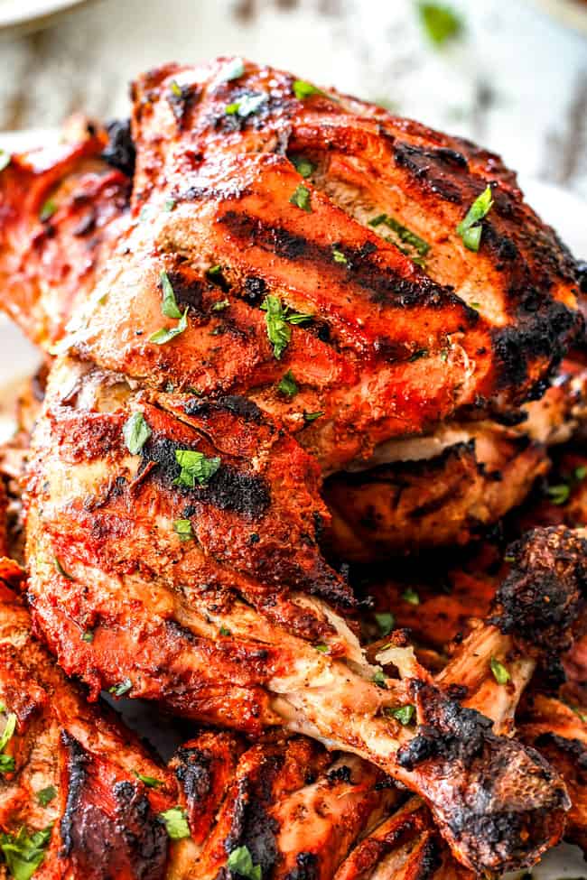 up close of Grilled Tandoori Chicken Recipe with slashed, marinated chicken