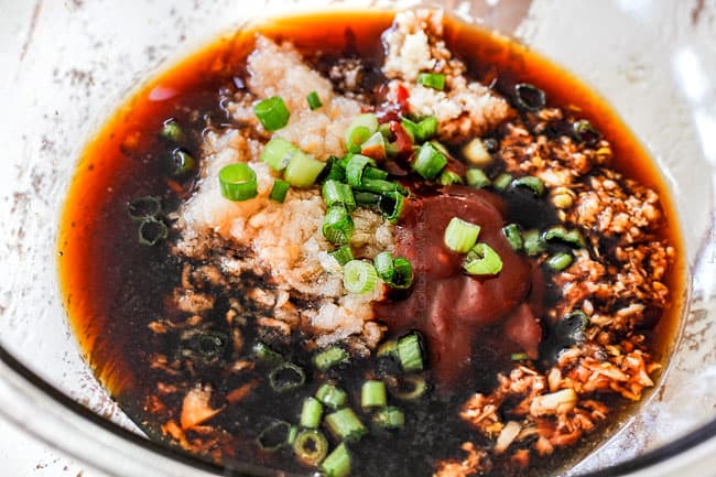 Showing how to make easy Bulgogi recipe by adding soy sauce, sesame oil, ginger, garlic, brown sugar, and grated Asian pear to a glass dish to make Korean marinade