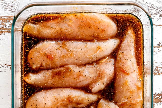 showing how to make sheet pan chicken by marinating chicken in maple apricot marinade