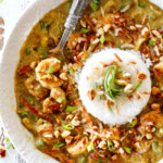 top view of Bang Bang Shrimp Copycat in a white bowl with a pile of rice in the center