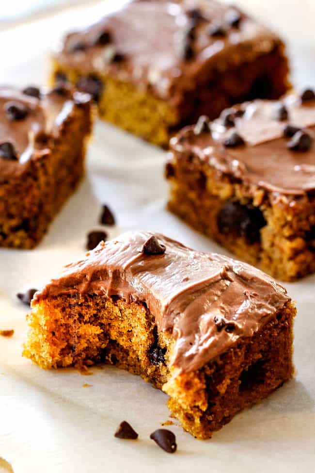 up close shot of pumpkin bar with a bite taken out of it