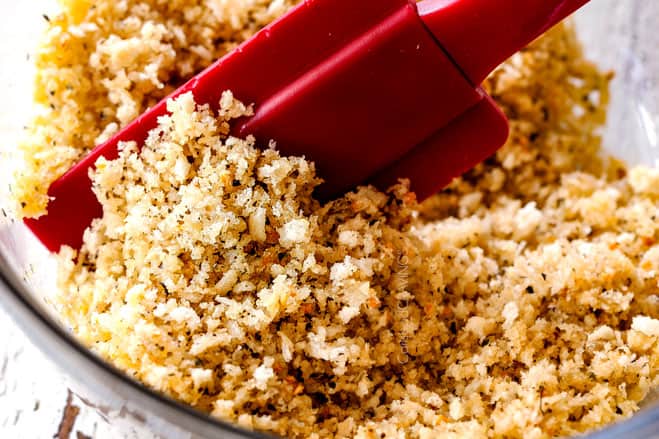 showing how to make sausage stuffed mushrooms by mixing panko with butter in a glass dish