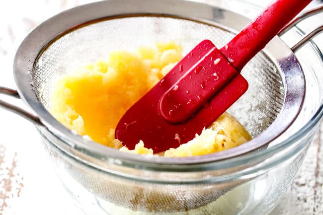 showing how to make ambrosia salad by removing excess juice from pineapple;e