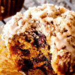 up close of the best pumpkin muffin with a bite out of it