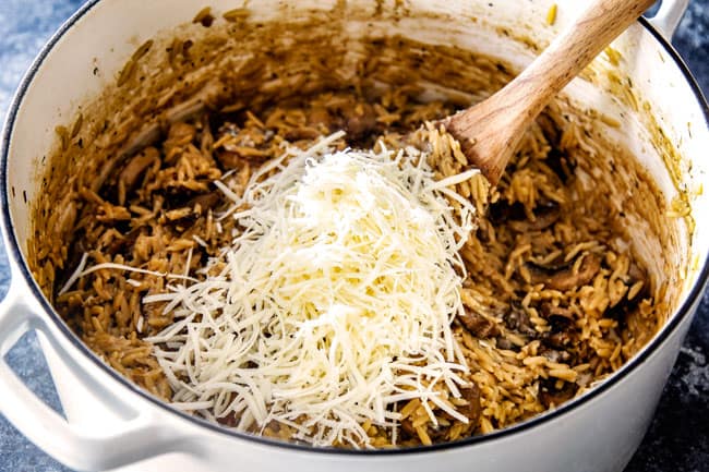 showing how to cook orzo pasta by stirring cheese into pasta