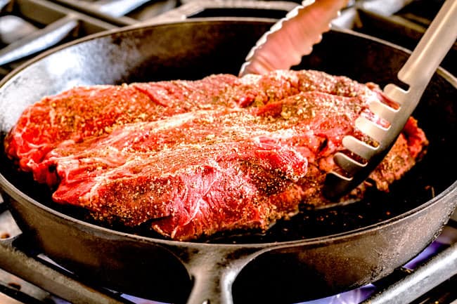 showing how to make Mississippi Pot Roast in crock pot by searing chuck roast in a cast iron skillet