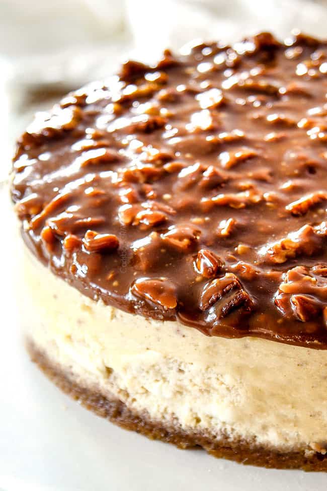 side view of pecan pie cheesecake with graham cracker crust recipe