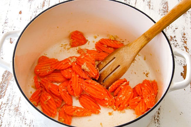 showing how to make easy wonton soup by cooking carrots before adding wonton soup ingredients