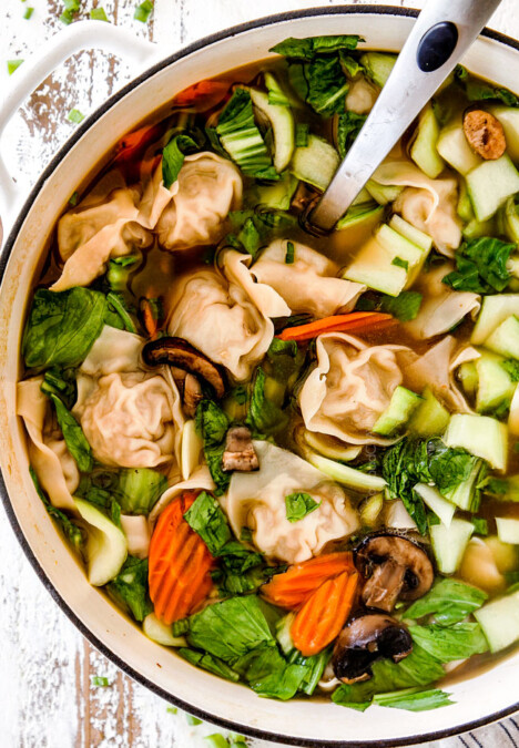 easy, authentic, homemade wonton soup recipe in a white soup pot