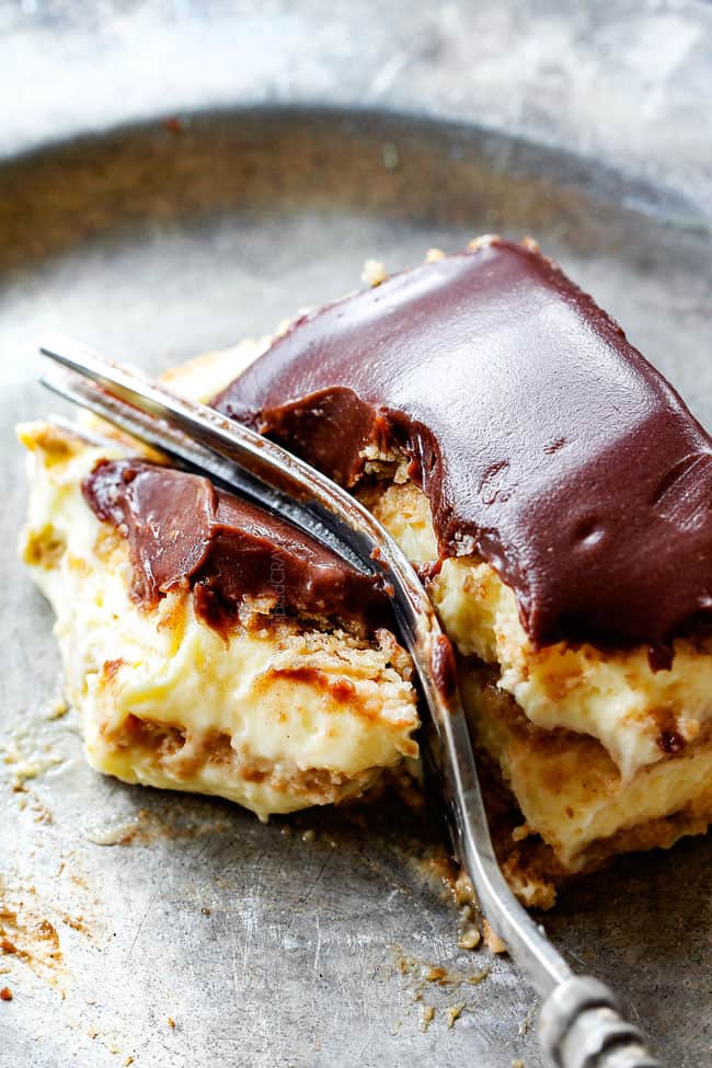top view of a forking taking a bite of Chocolate Eclair Cake